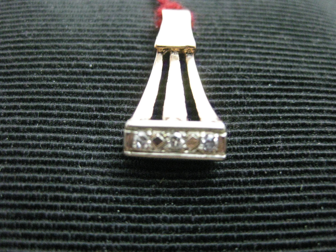 g305 Simple yet Elegant 14kt Rose Gold Pendant with 3 Diamonds .03cts