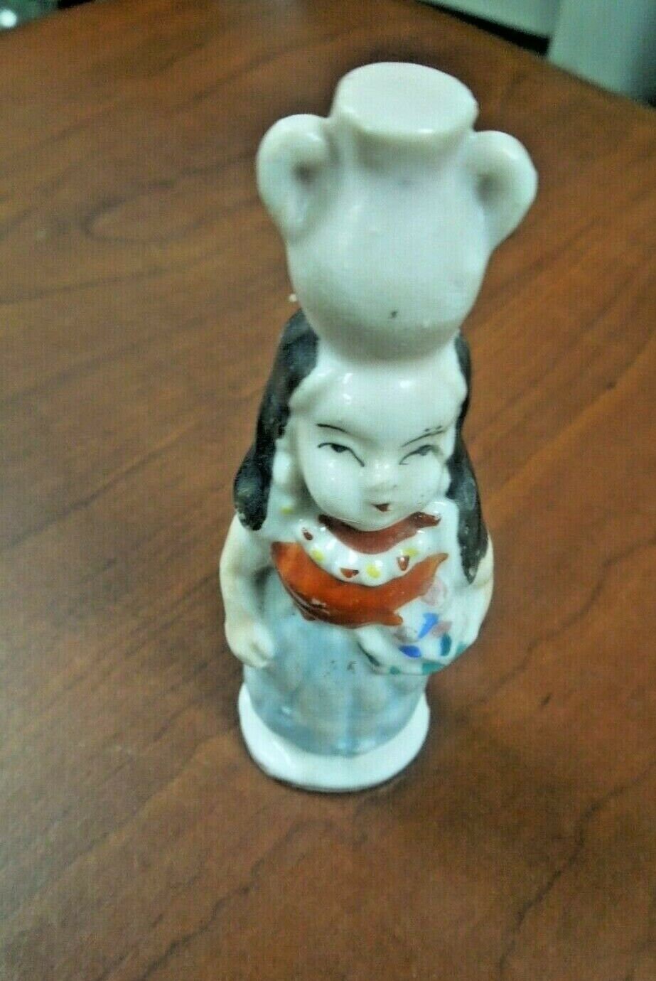 r102 Made In Japan ceramic figurineWomen holding vase on Head Rare Collectibles