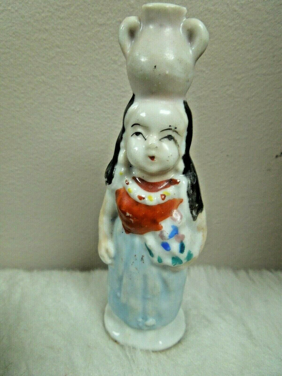 r102 Made In Japan ceramic figurineWomen holding vase on Head Rare Collectibles