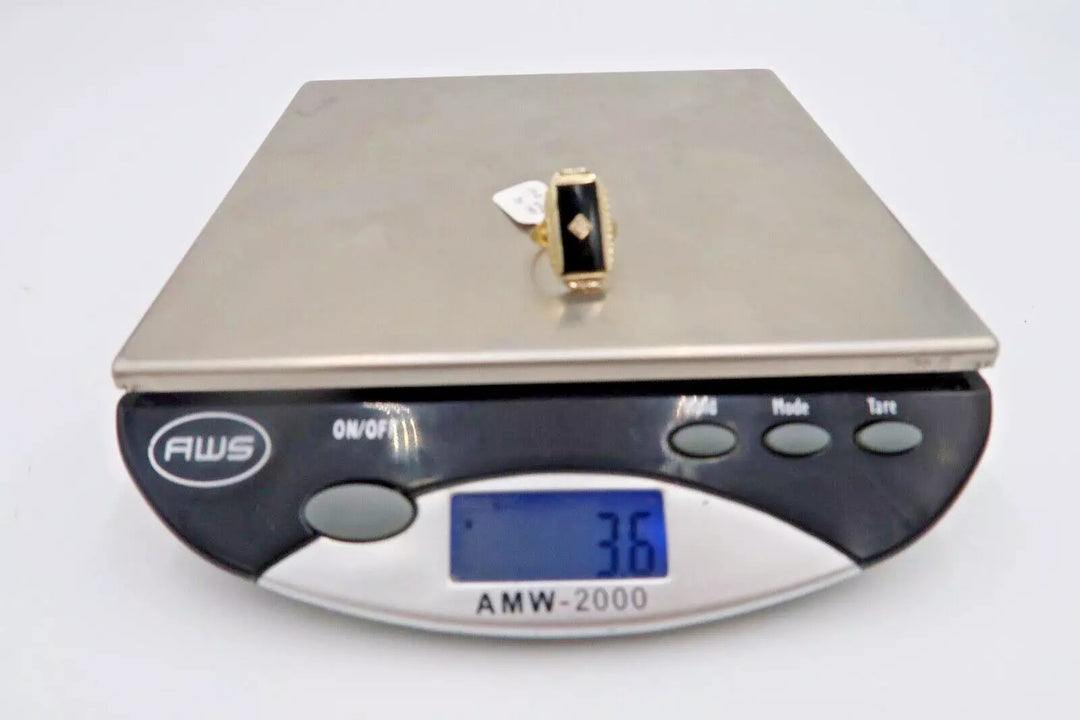 t427 10k Yellow Gold Diamond .01 cts Onyx Ring Size 4(US)Signed