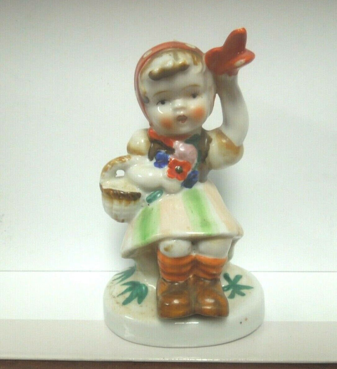 r099 Occupied Japan ceramic figurine, little girl sitting on mushroom scarf & basket