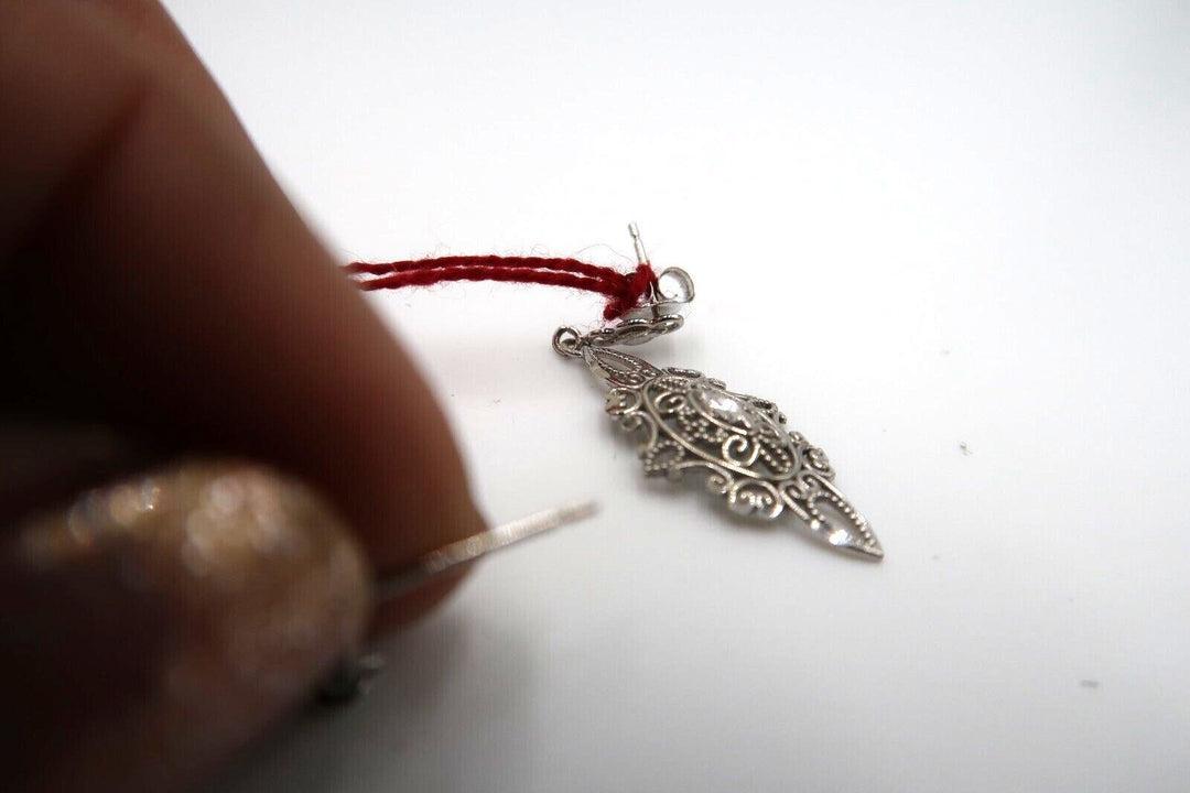 For sale: (1) t260 Pretty Pair of 14kt White Gold Filigree earrings