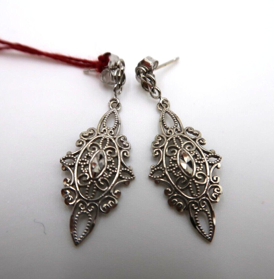 For sale: (1) t260 Pretty Pair of 14kt White Gold Filigree earrings
