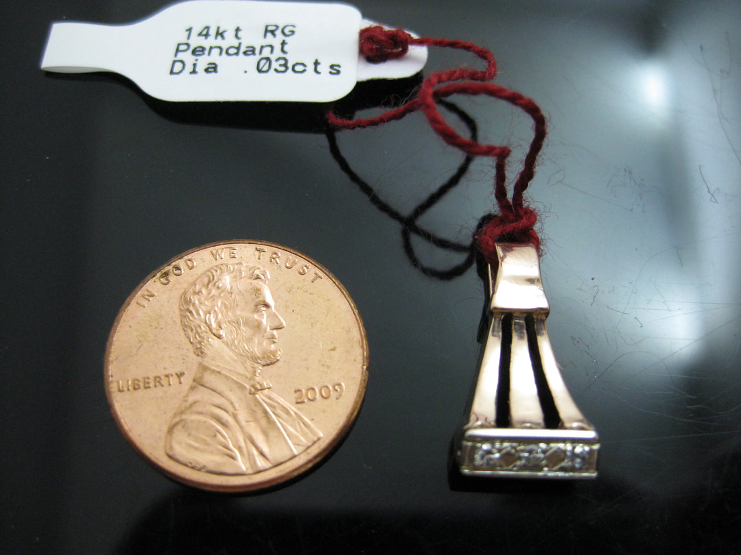g305 Simple yet Elegant 14kt Rose Gold Pendant with 3 Diamonds .03cts