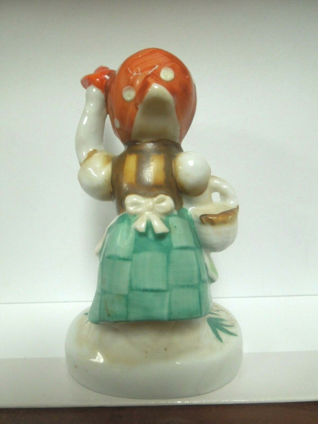 r099 Occupied Japan ceramic figurine, little girl sitting on mushroom scarf & basket