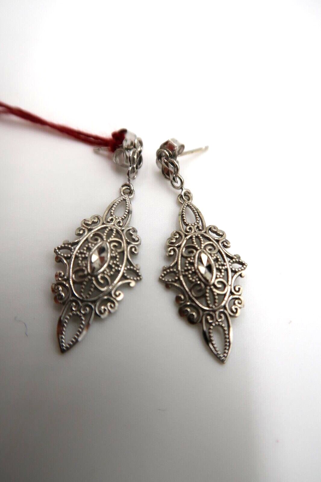 For sale: (1) t260 Pretty Pair of 14kt White Gold Filigree earrings