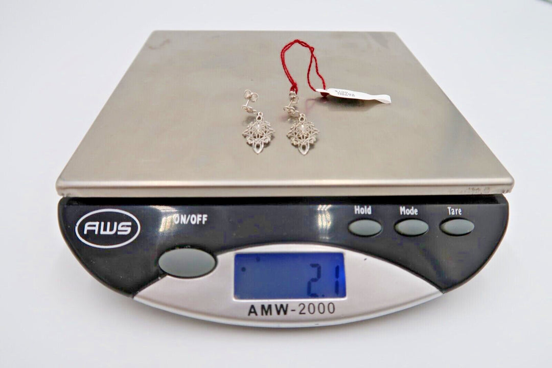 For sale: (1) t260 Pretty Pair of 14kt White Gold Filigree earrings