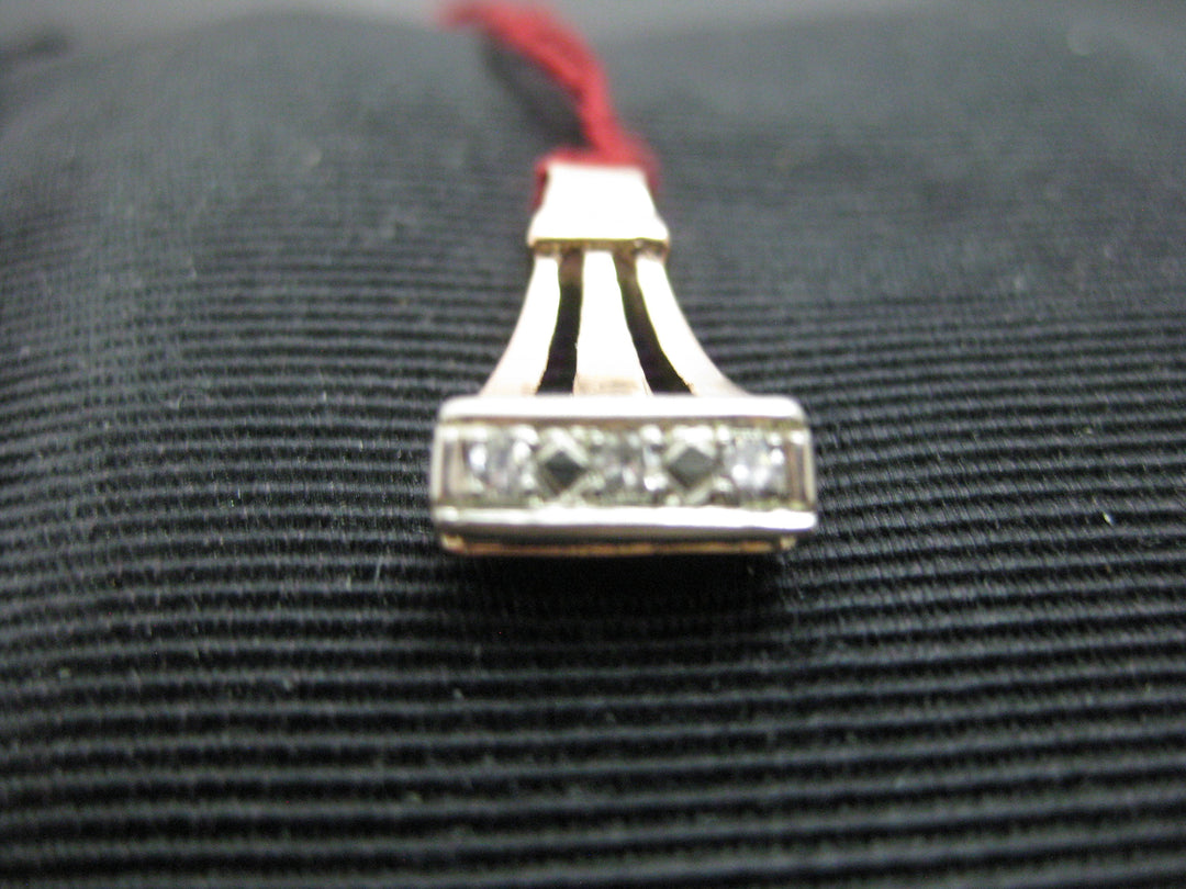 g305 Simple yet Elegant 14kt Rose Gold Pendant with 3 Diamonds .03cts