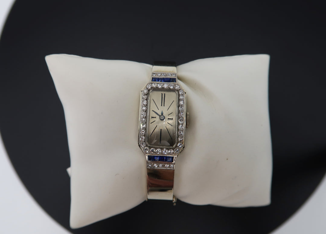 p498 Vintage Ladies 18k White Gold Diamond/ Sapphire Bangle watch