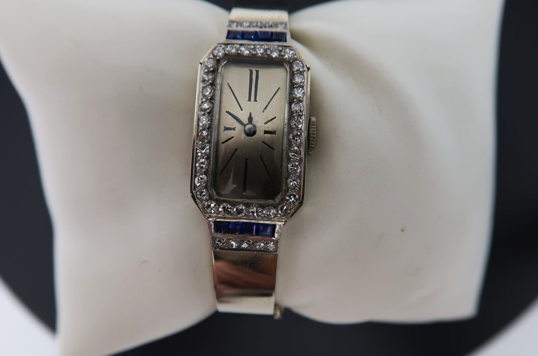 p498 Vintage Ladies 18k White Gold Diamond/ Sapphire Bangle watch