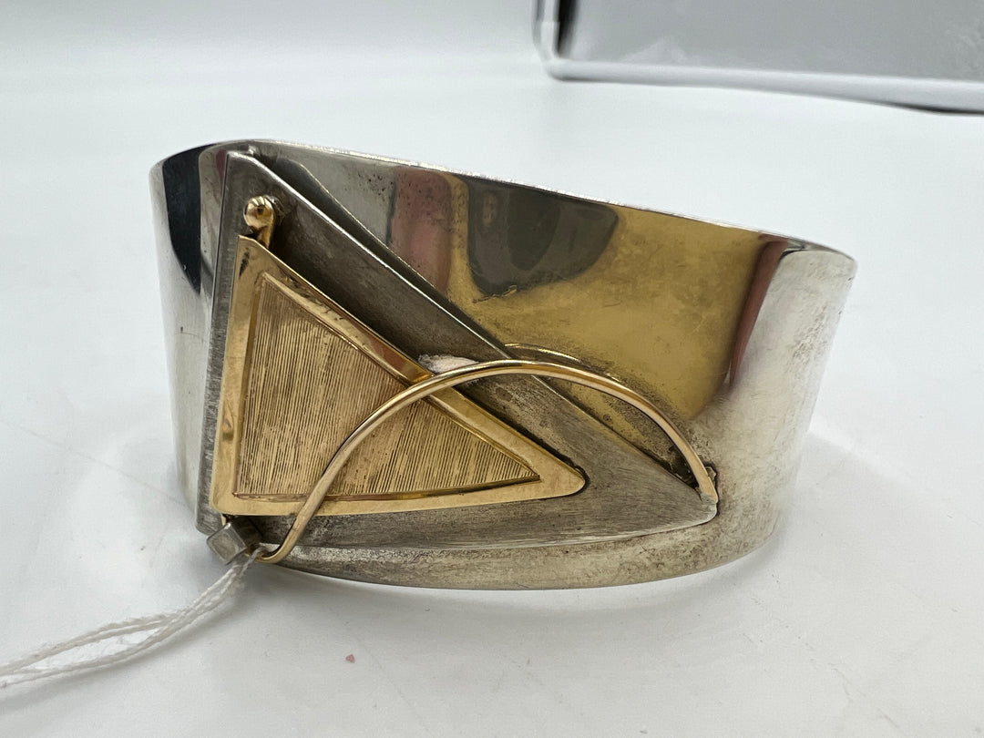 t752 Elegant De Marcay Gold and Silver Bangle Bracelet