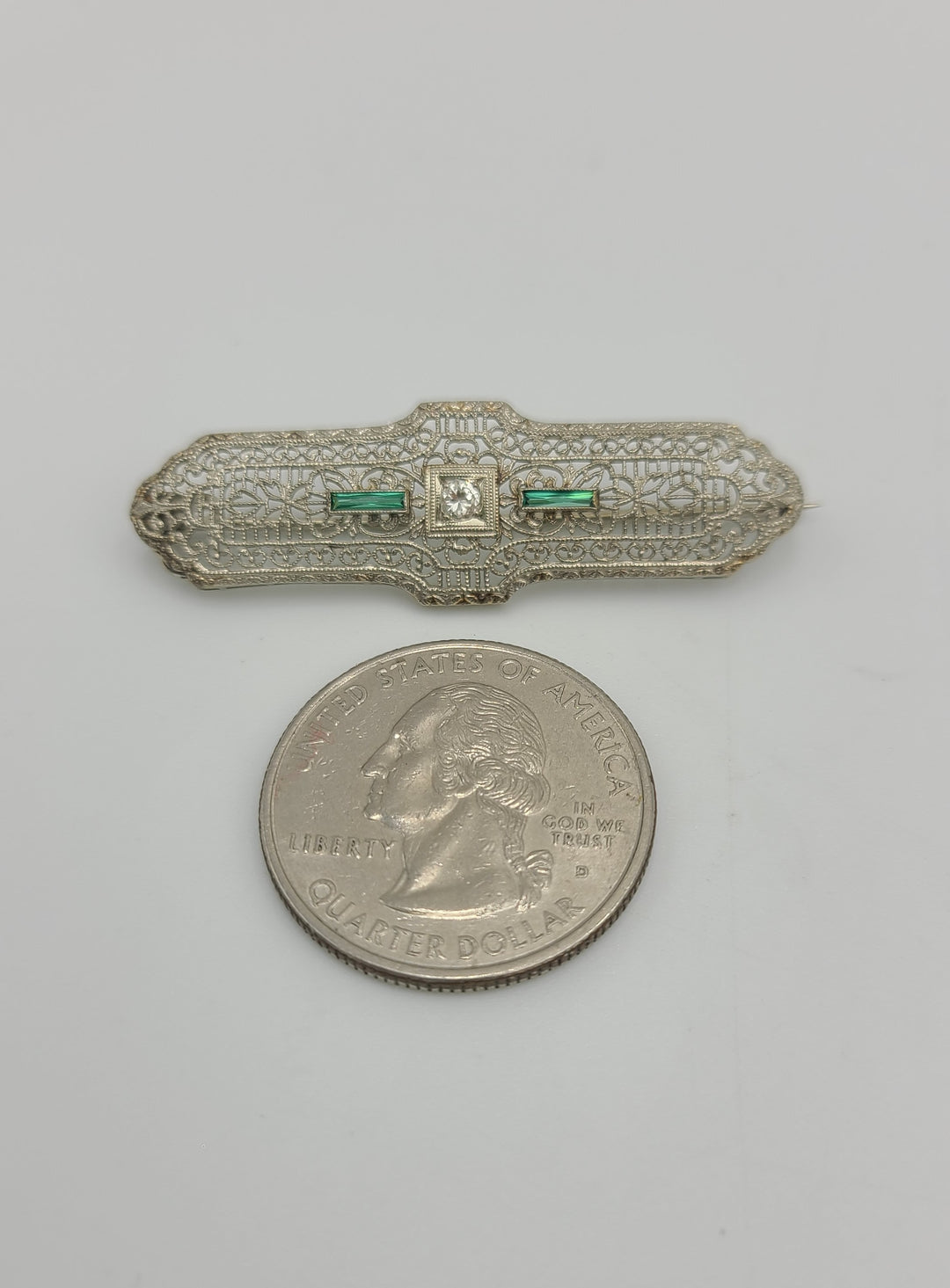m674 Lovely Vintage 1920s Ladies Diamond and Emerald Bar Pin in 10kt White Gold