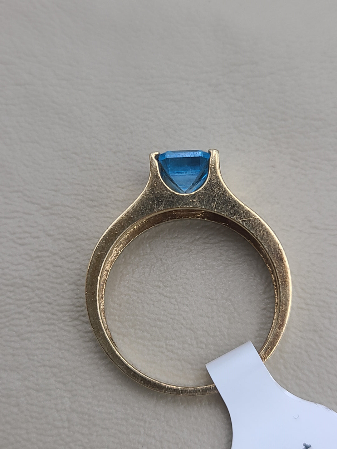 k870 Nice Unisex Emerald Cut Blue Topaz set in 14kt Yellow Gold