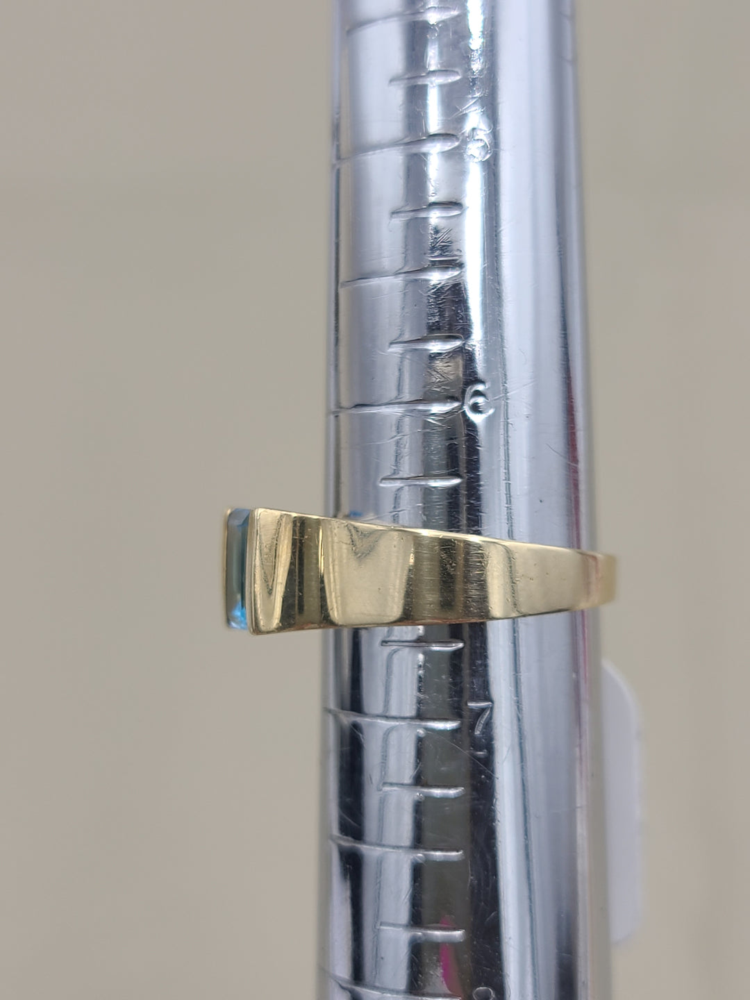 k870 Nice Unisex Emerald Cut Blue Topaz set in 14kt Yellow Gold