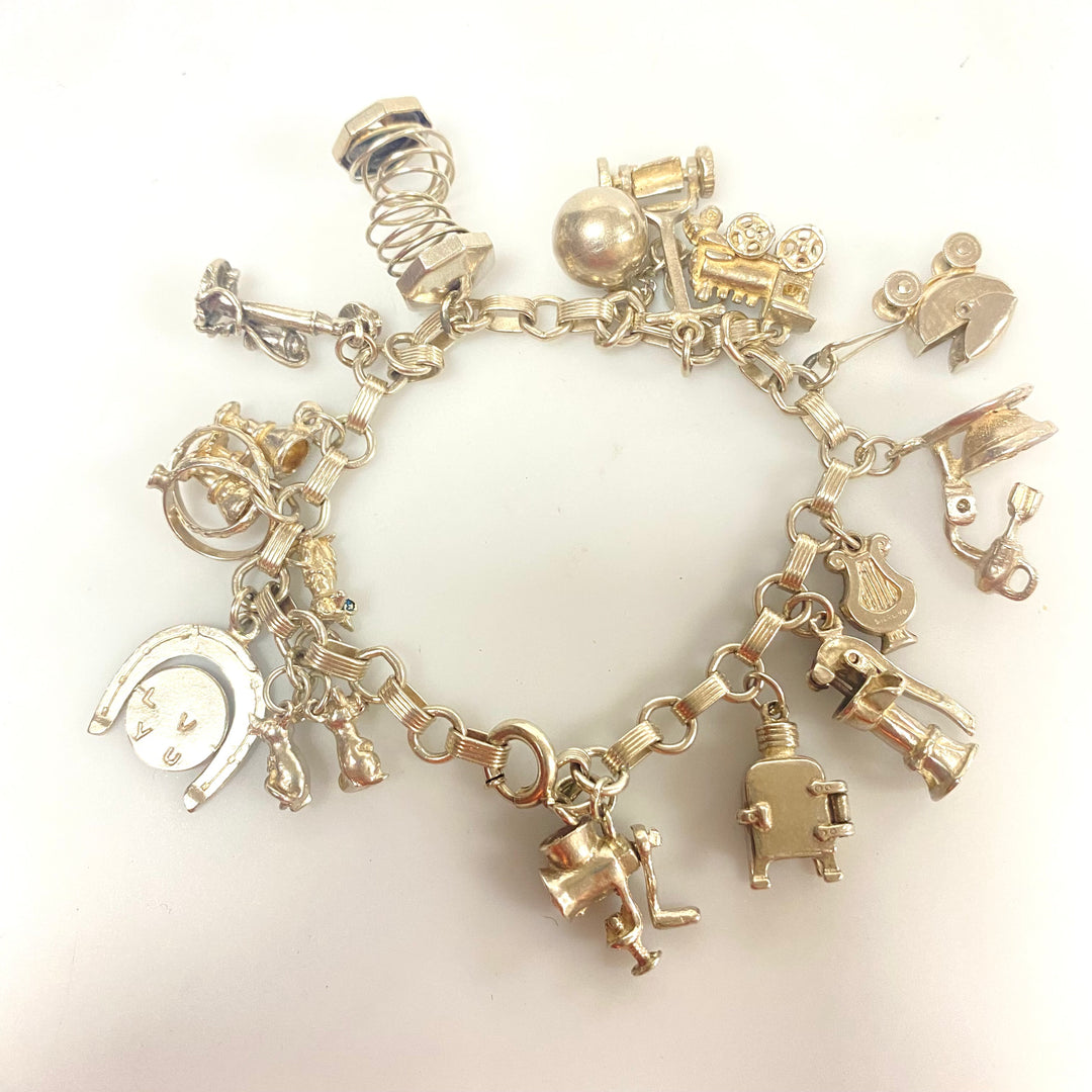j848 Vintage Sterling Silver Chain Bracelet with multiple Various Charm Pendants