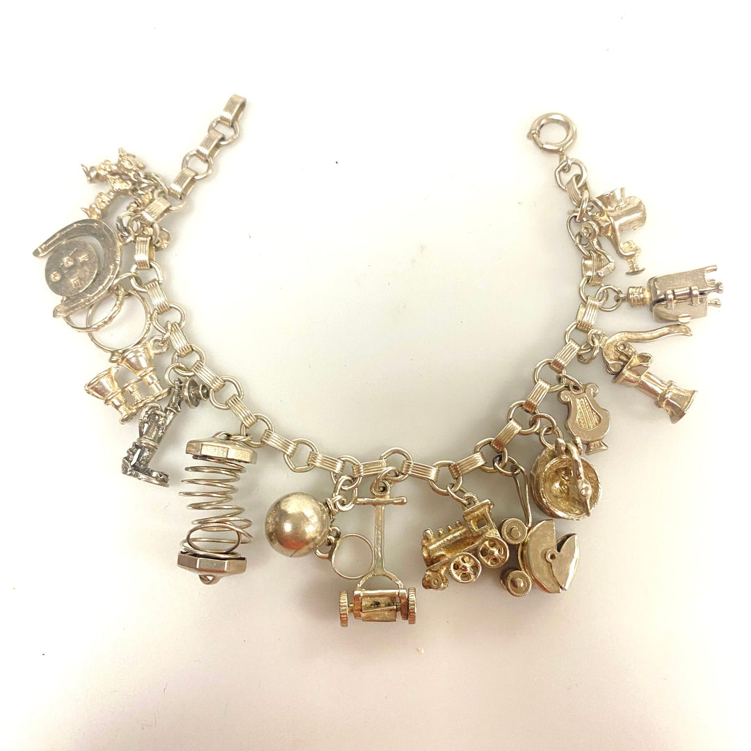 j848 Vintage Sterling Silver Chain Bracelet with multiple Various Charm Pendants