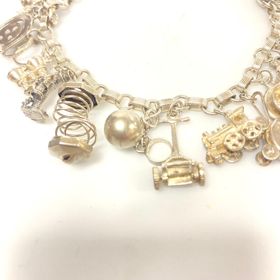 j848 Vintage Sterling Silver Chain Bracelet with multiple Various Charm Pendants