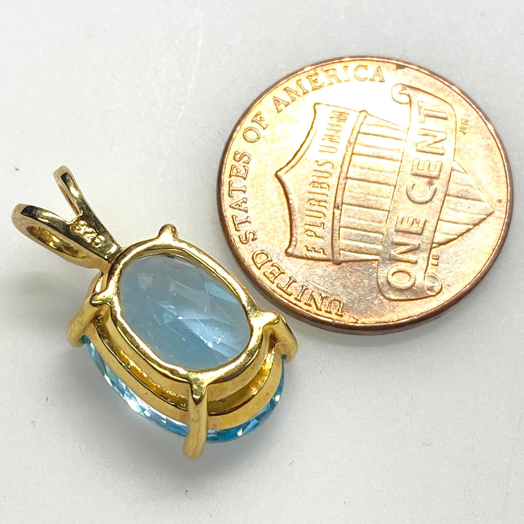 m772 Vintage Sterling Silver 925 Gold Tone Oval Faceted Blue Topaz Pendant