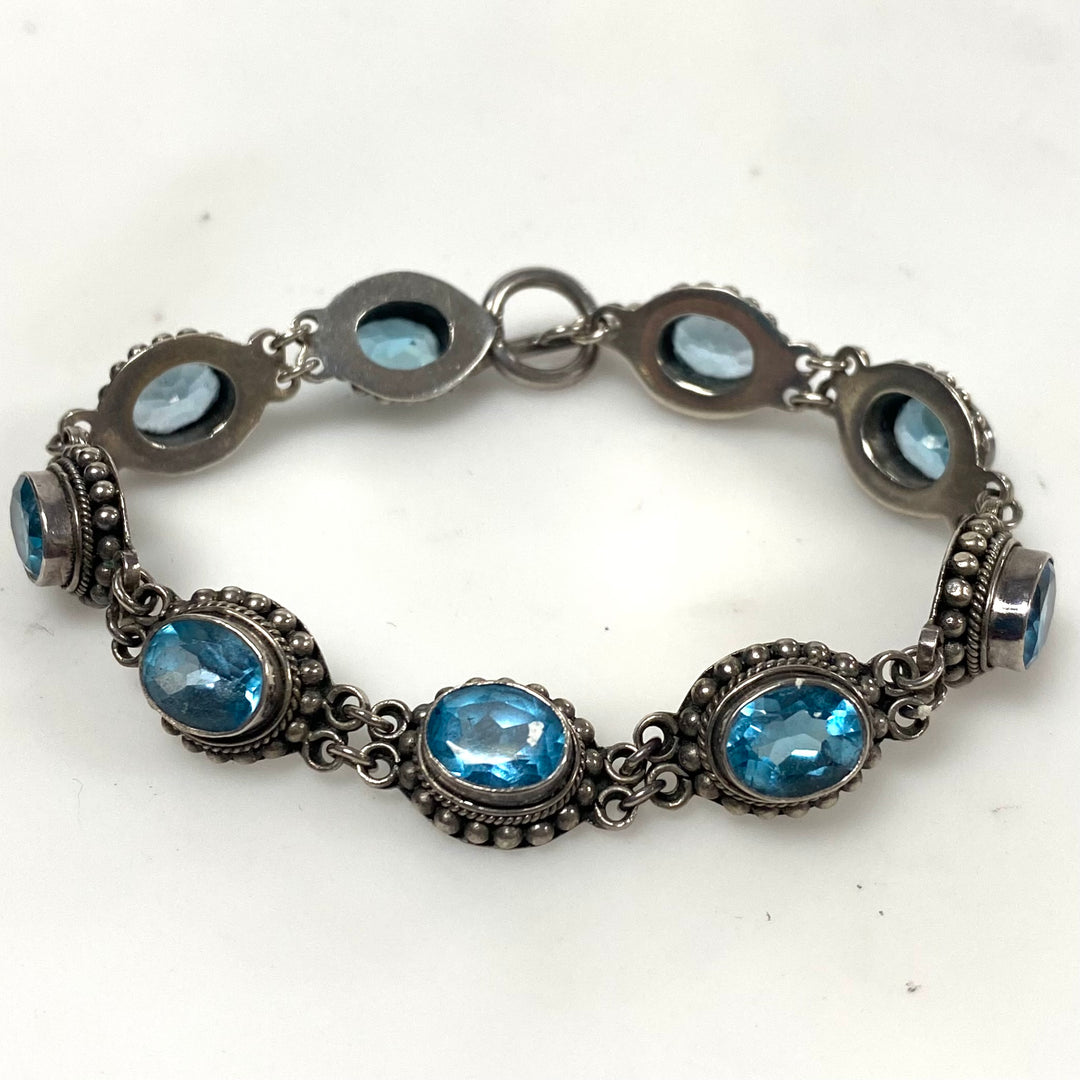 m879 Vintage Artisan Suarti Bali Sterling Silver Oval Blue Topaz Toggle Bracelet