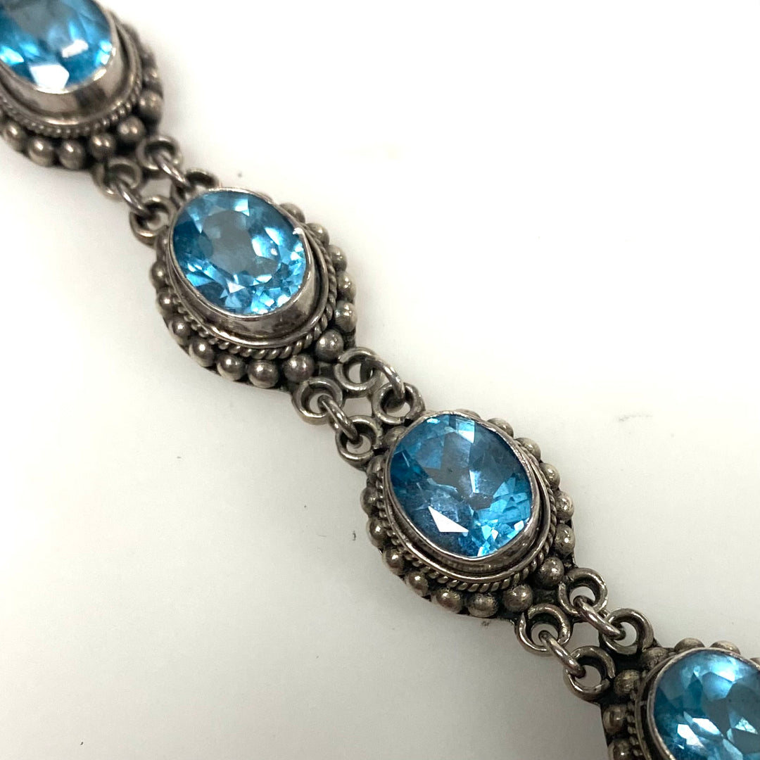 m879 Vintage Artisan Suarti Bali Sterling Silver Oval Blue Topaz Toggle Bracelet