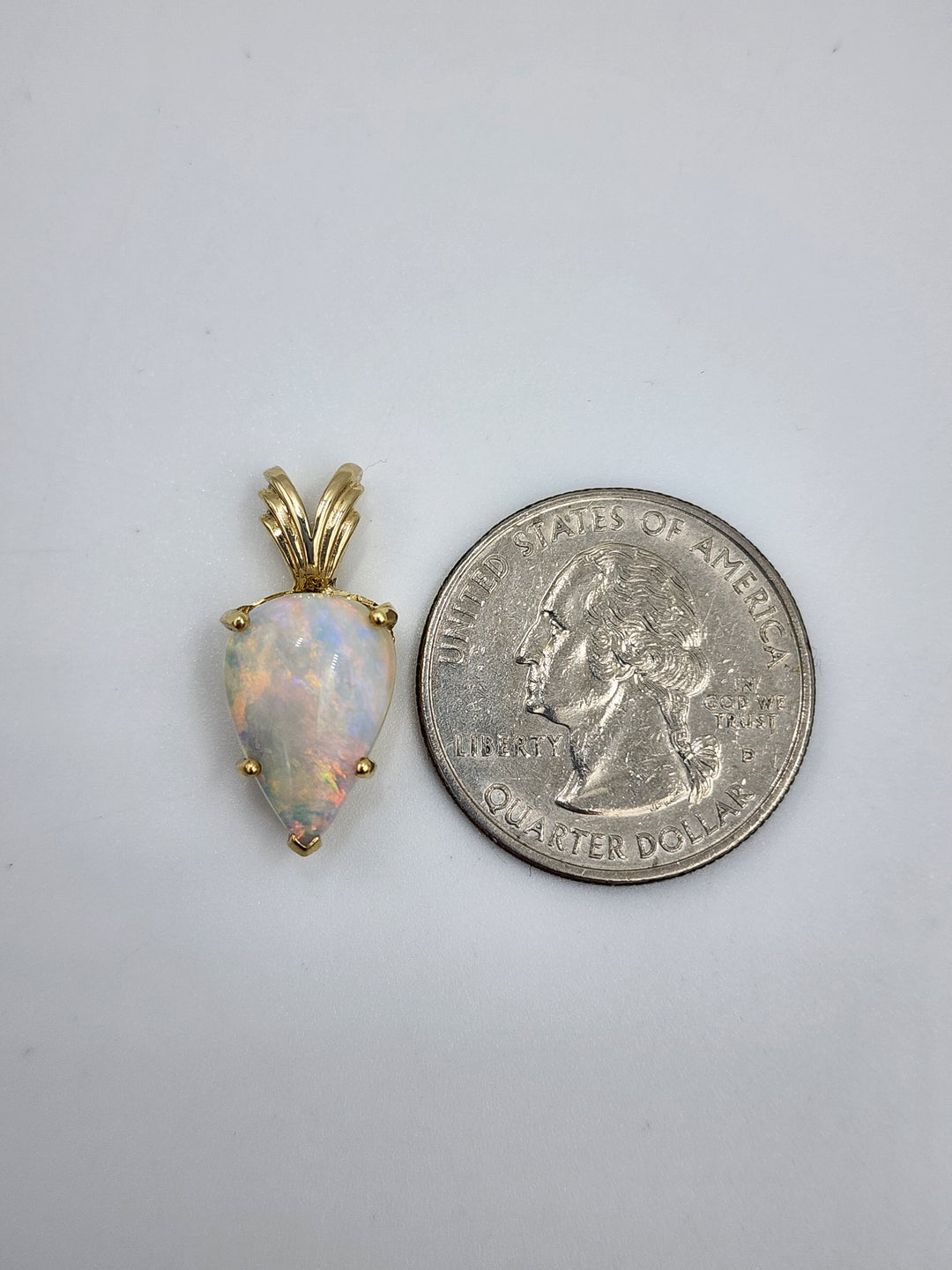 m705 Ladies Gorgeous 14kt Yellow Gold Pear Shaped Opal Pendant