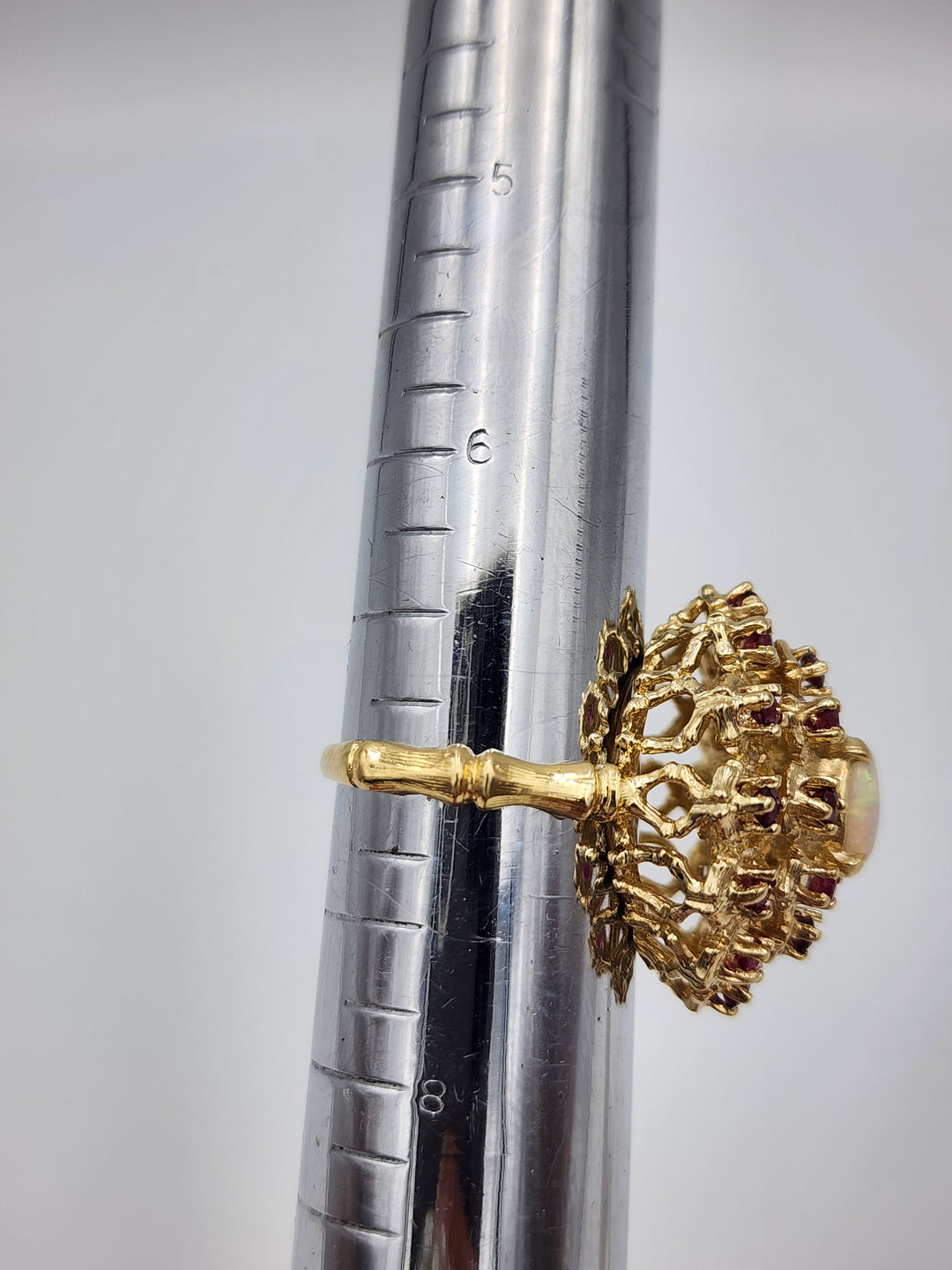 u973 Pretty Ruby and Opal Cluster Ring set in 14kt Yellow Gold