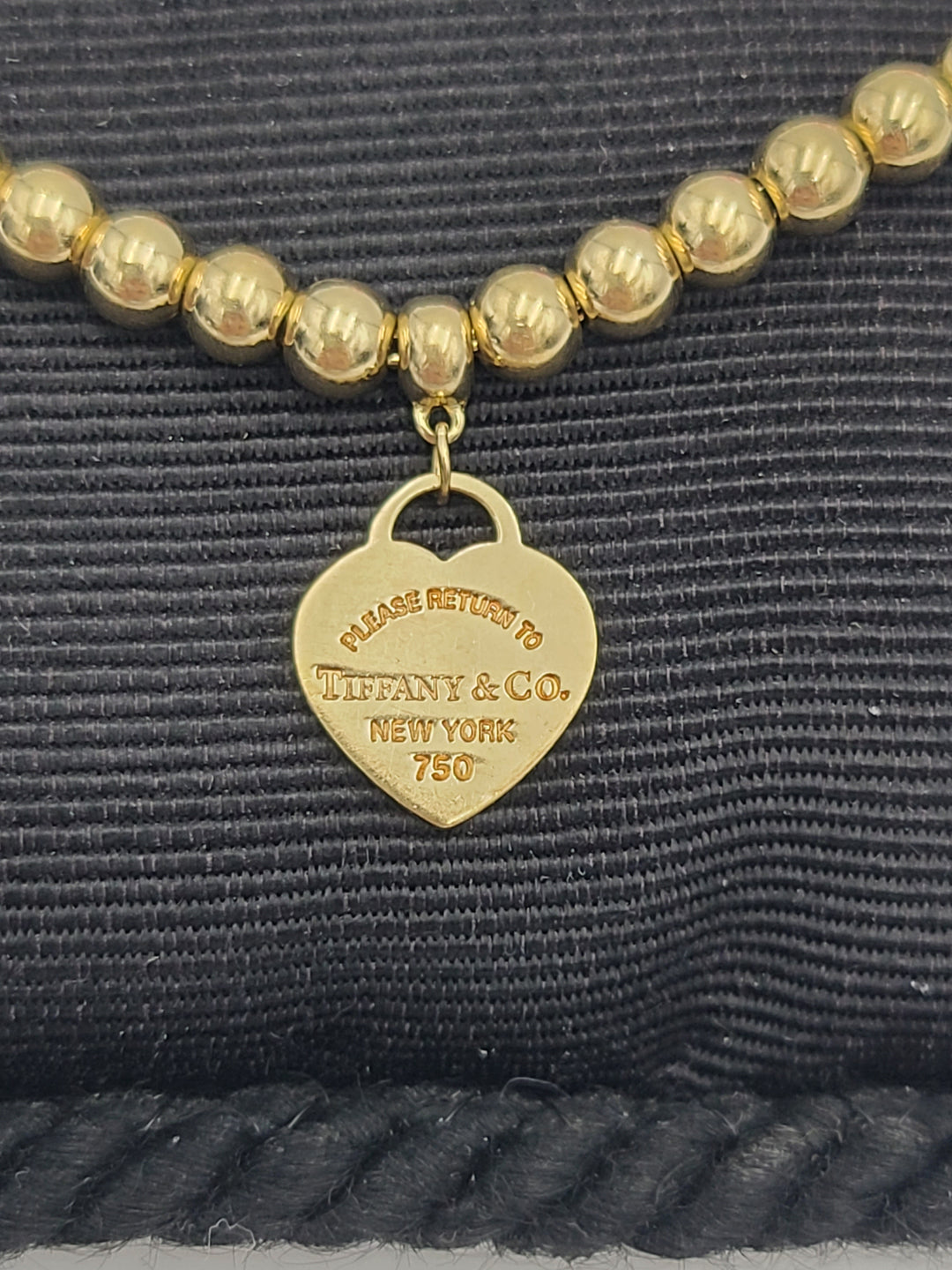 k804 Ladies Lovely 18kt Yellow Gold Beaded Heart ID Tiffany and Co 7" Bracelet