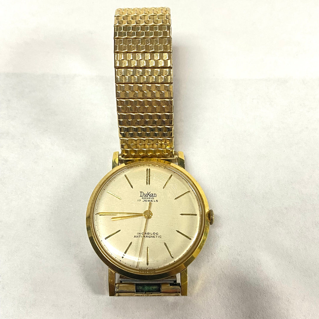 u516 Vintage DuKan Geneve Mechanical Incabloc Gold Tone Wrist Watch 1970's