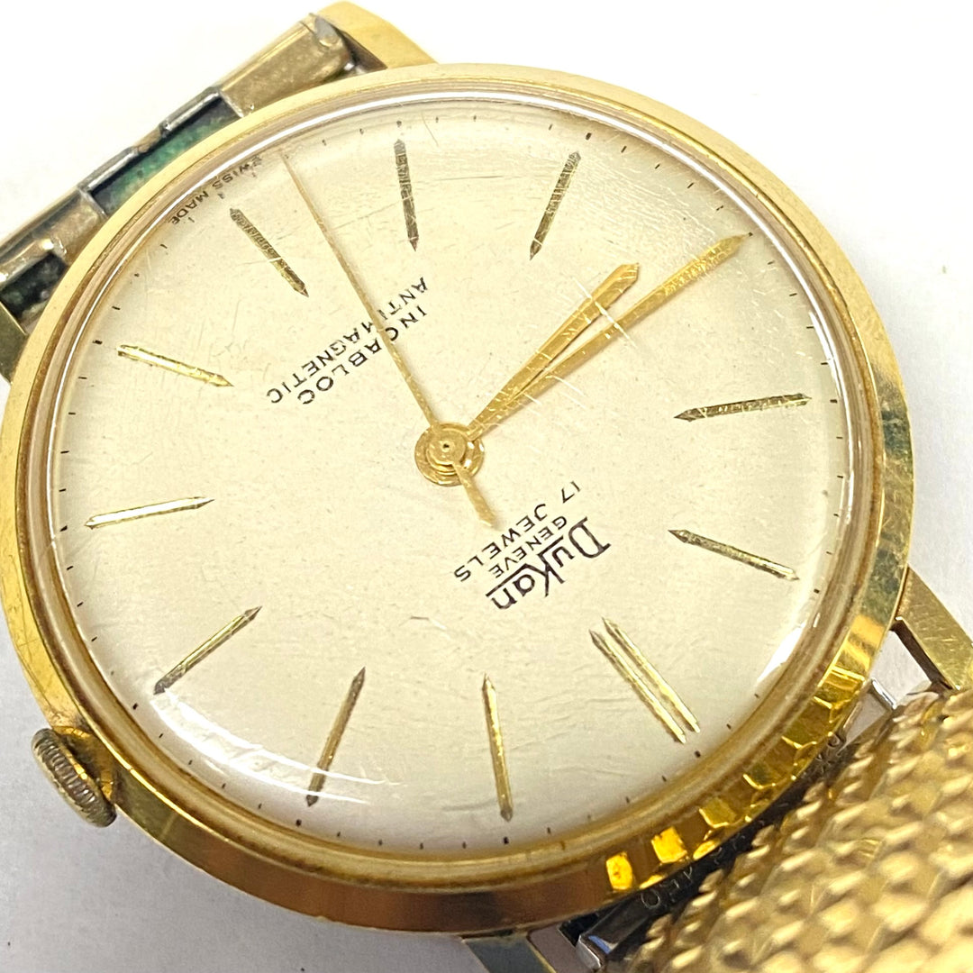 u516 Vintage DuKan Geneve Mechanical Incabloc Gold Tone Wrist Watch 1970's