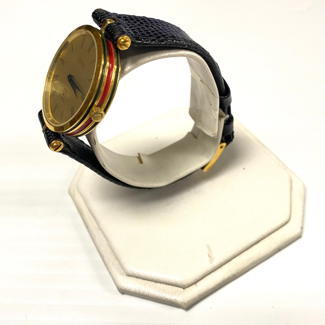 u727 Vintage Gucci Swiss Made Quartz Gold Tone Black Leather Unisex Wrist Watch