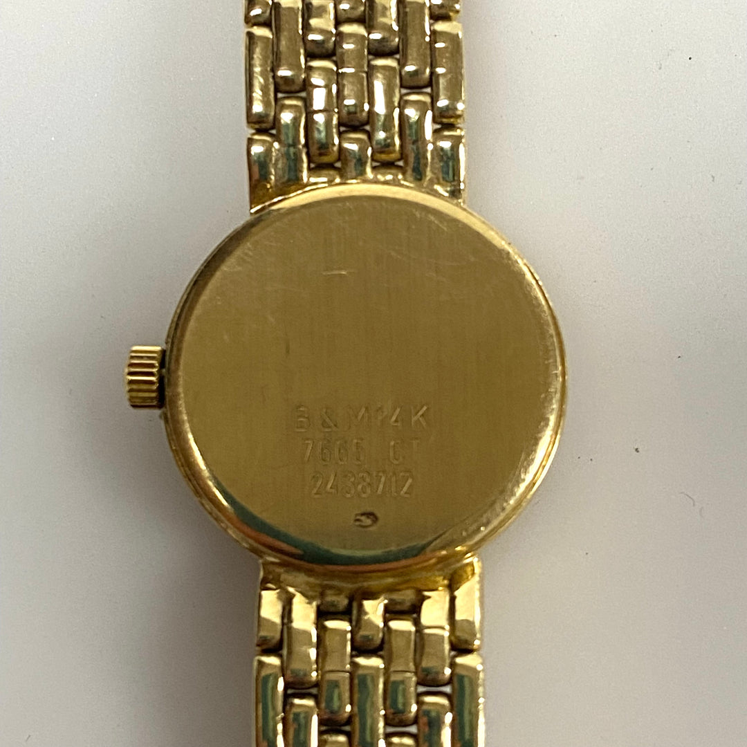 v353 Vintage Baume & Mercier 14K Yellow Gold Swiss Quartz 7665 Ladie's Wrist Watch