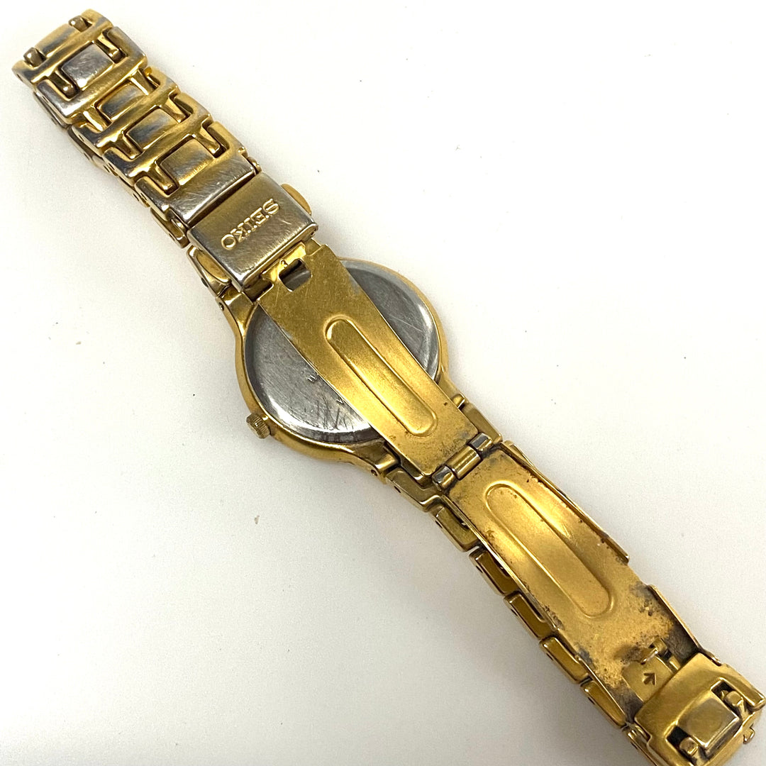 v485 Vintage Seiko Gold Tone Stainless V401-2090 Water Resistant Wrist Watch