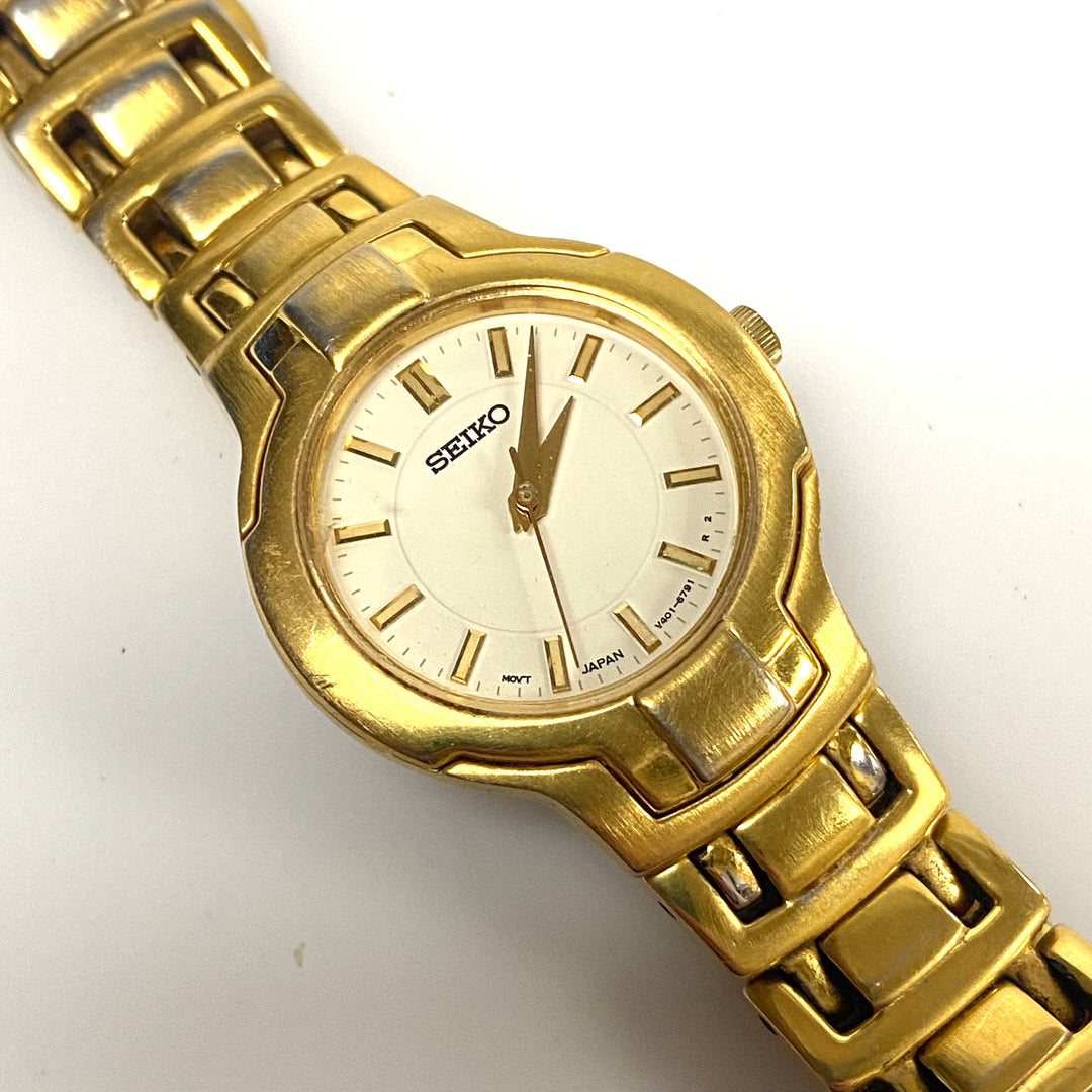 v485 Vintage Seiko Gold Tone Stainless V401-2090 Water Resistant Wrist Watch