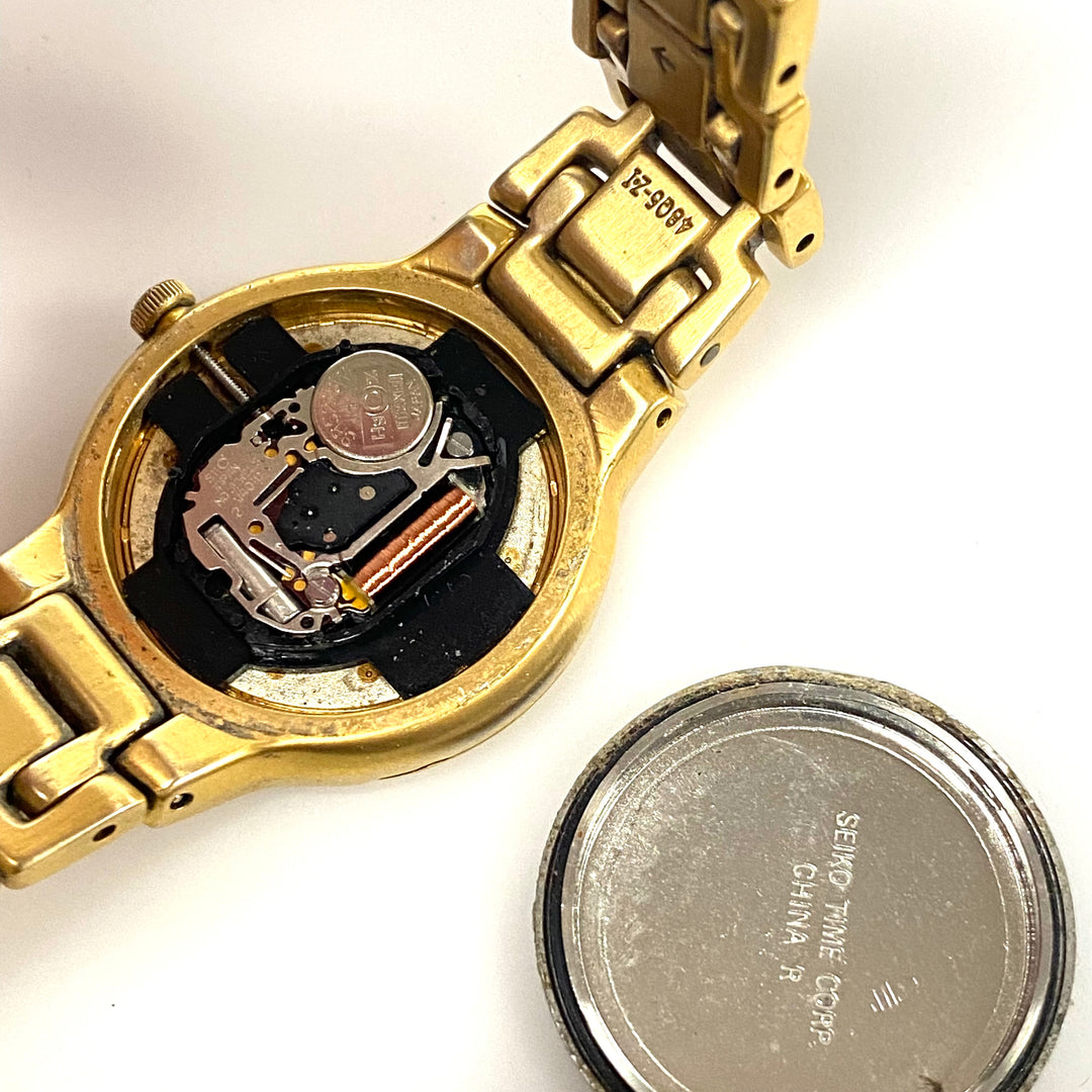 v485 Vintage Seiko Gold Tone Stainless V401-2090 Water Resistant Wrist Watch