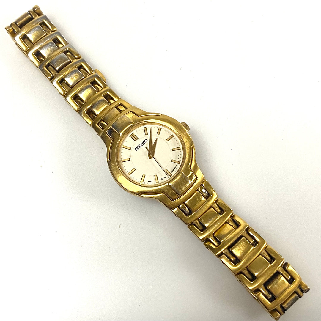 v485 Vintage Seiko Gold Tone Stainless V401-2090 Water Resistant Wrist Watch