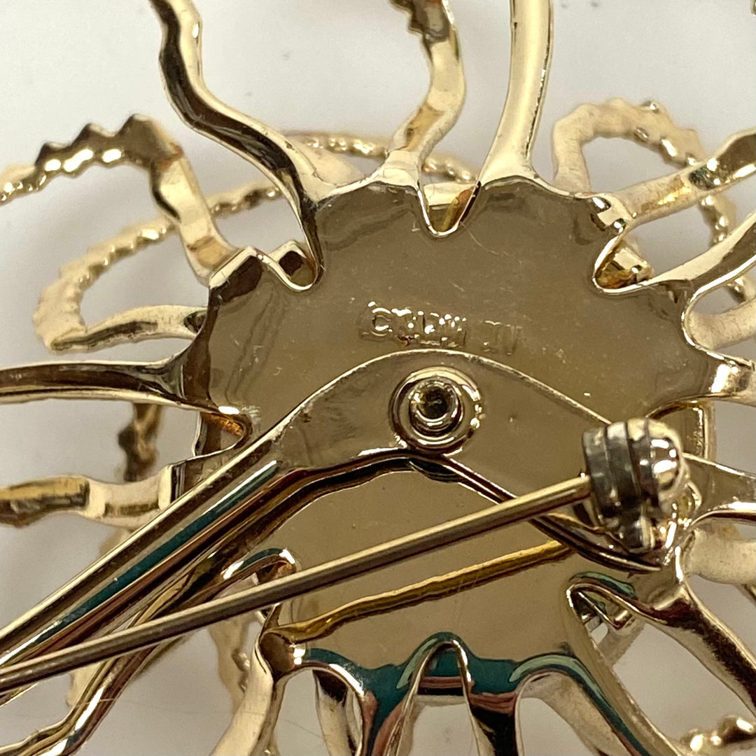 v498 Vintage 1960s Sarah Coventry "Allusion" gold-tone flower brooch with aurora borealis crystals