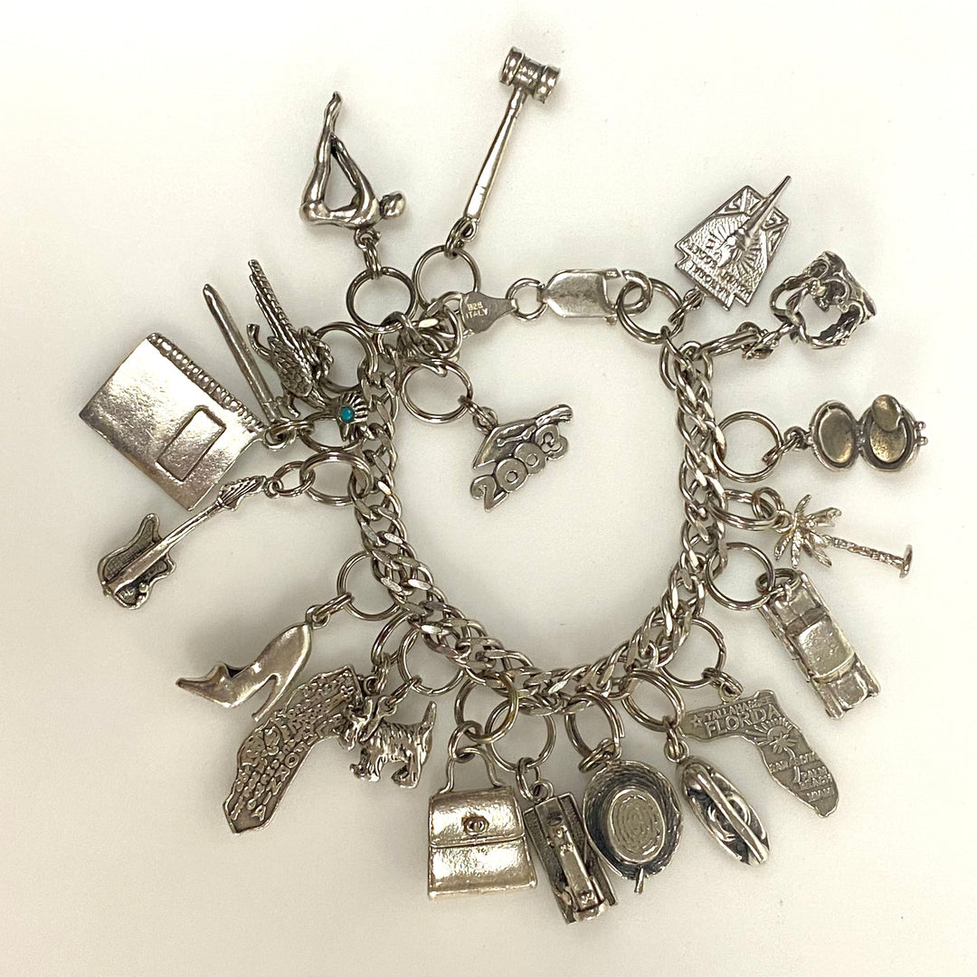 v540 Vintage Sterling Silver Chain Bracelet with multiple Various Charm Pendants