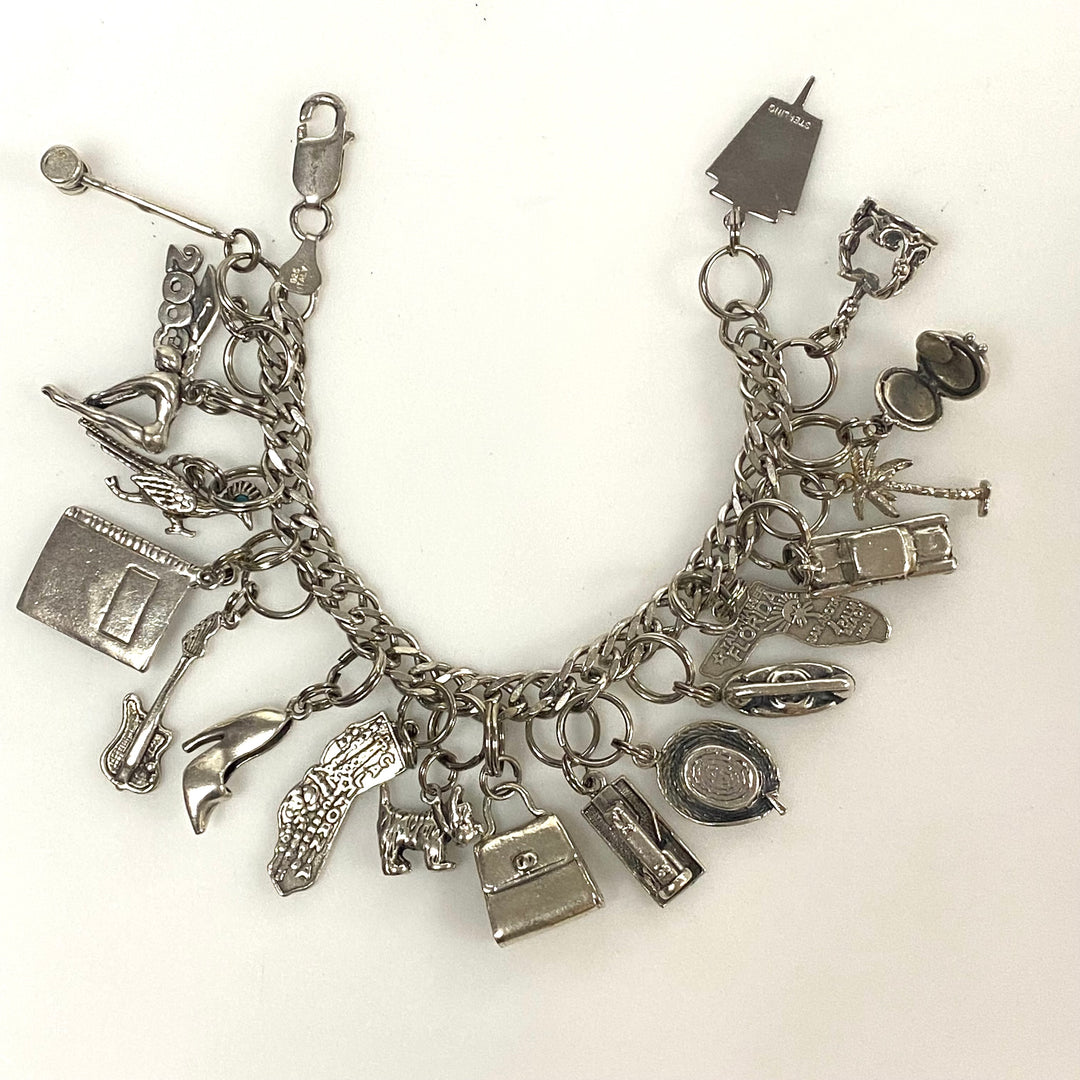 v540 Vintage Sterling Silver Chain Bracelet with multiple Various Charm Pendants
