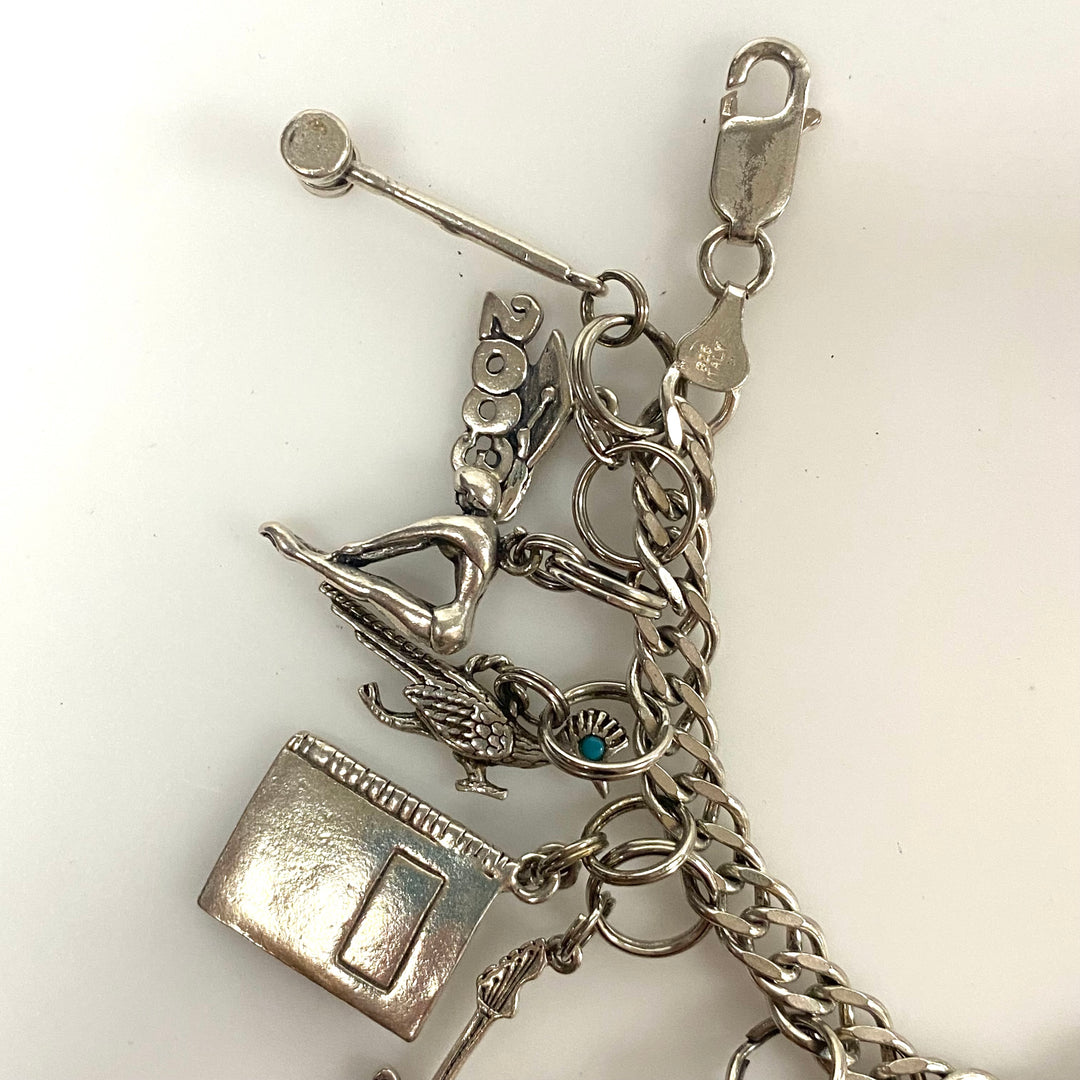 v540 Vintage Sterling Silver Chain Bracelet with multiple Various Charm Pendants