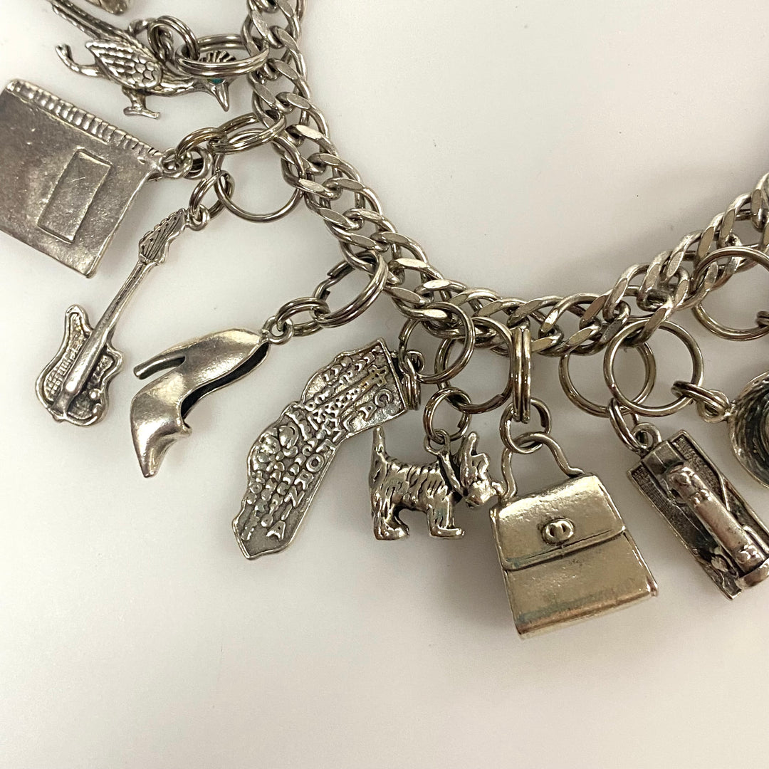 v540 Vintage Sterling Silver Chain Bracelet with multiple Various Charm Pendants