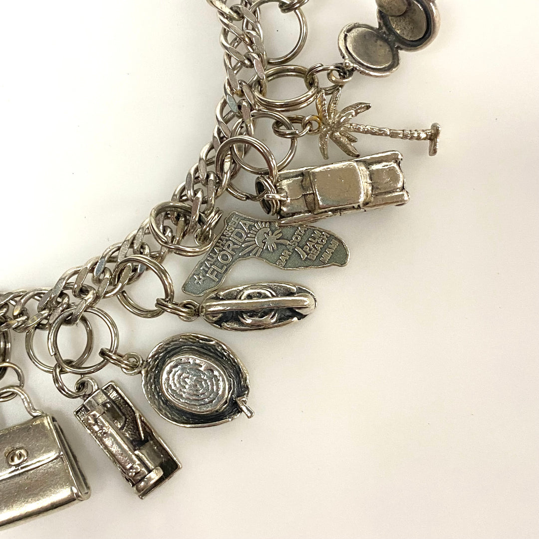 v540 Vintage Sterling Silver Chain Bracelet with multiple Various Charm Pendants