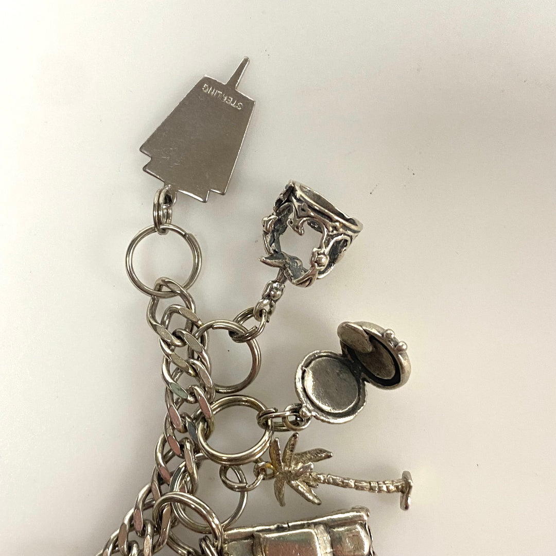 v540 Vintage Sterling Silver Chain Bracelet with multiple Various Charm Pendants