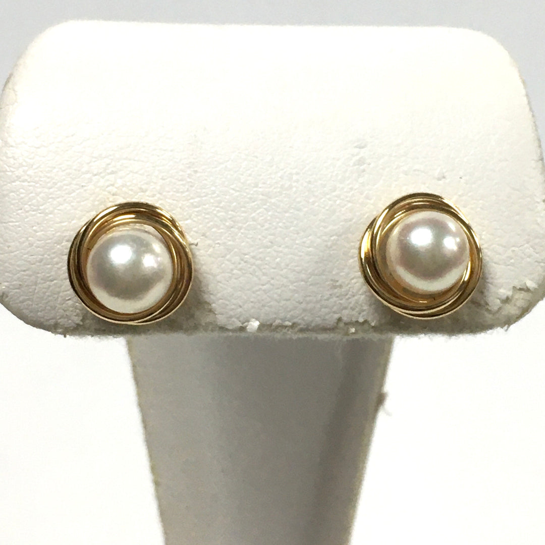 v694 Vintage 14k Yellow Gold Pearl Stud Pierced Earrings with Twisted Halo Design