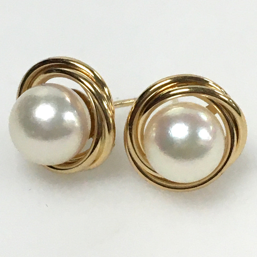 v694 Vintage 14k Yellow Gold Pearl Stud Pierced Earrings with Twisted Halo Design