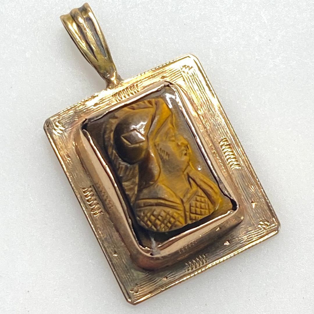 v873 Vintage 10k Yellow Gold Pendant Tiger's Eye Gemstone Carved with Intaglio Profile intaglio profile of a Roman soldier or centurion