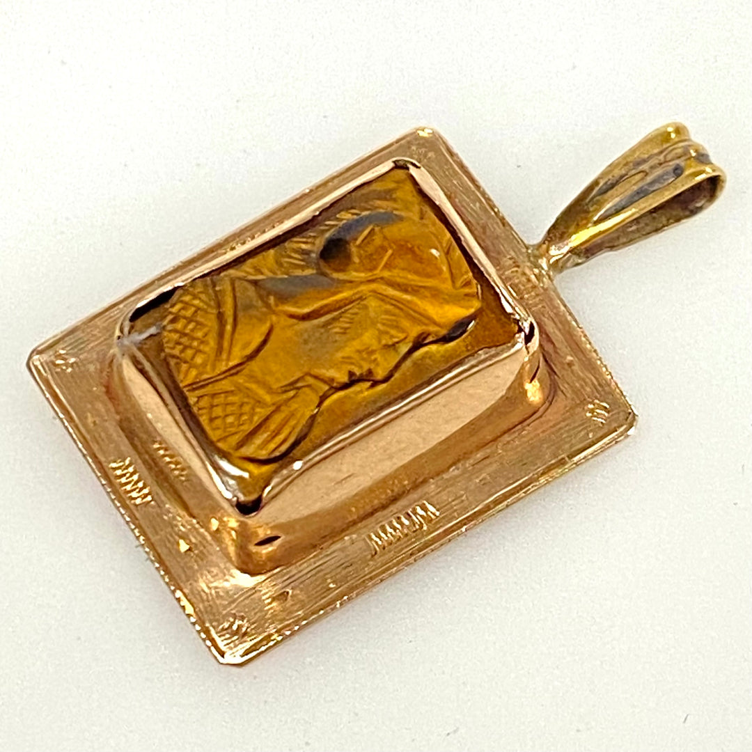 v873 Vintage 10k Yellow Gold Pendant Tiger's Eye Gemstone Carved with Intaglio Profile intaglio profile of a Roman soldier or centurion