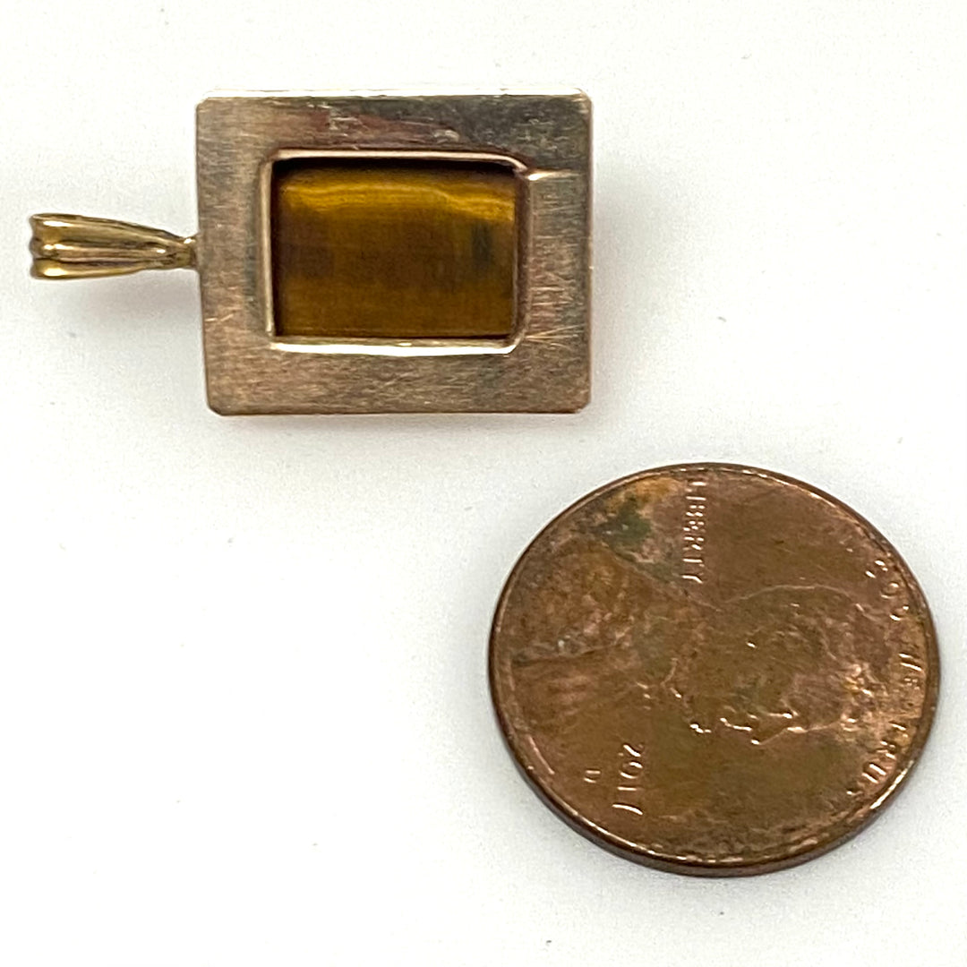 v873 Vintage 10k Yellow Gold Pendant Tiger's Eye Gemstone Carved with Intaglio Profile intaglio profile of a Roman soldier or centurion