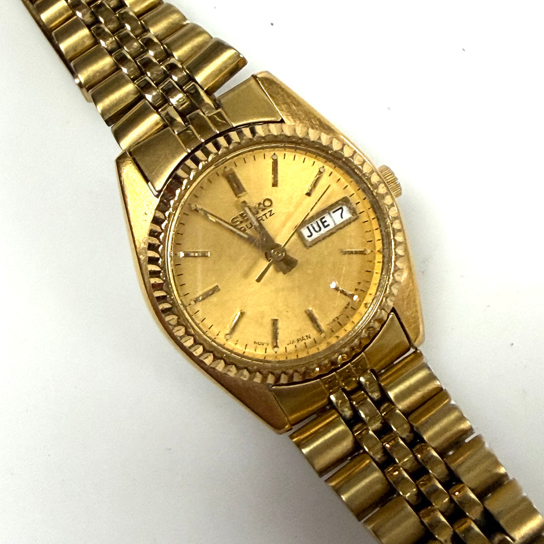 w019 Vintage Seiko Quartz "Presidential style" day-date Gold Tone Wrist Watch