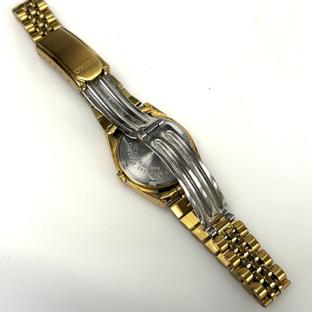 w019 Vintage Seiko Quartz "Presidential style" day-date Gold Tone Wrist Watch