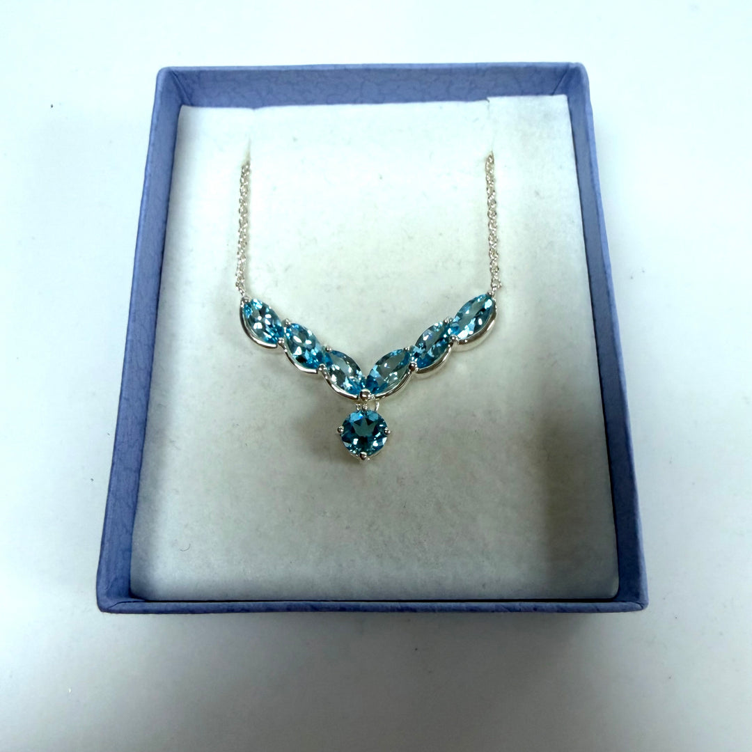 w139 Vintage V-shaped Pendant Necklace Featuring Blue Topaz in Sterling Silver